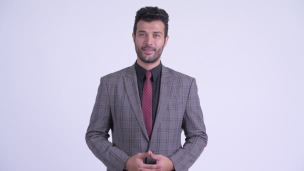 Щасливий бородатий Перська бізнесмен говорити і киваючи голову так — стокове відео