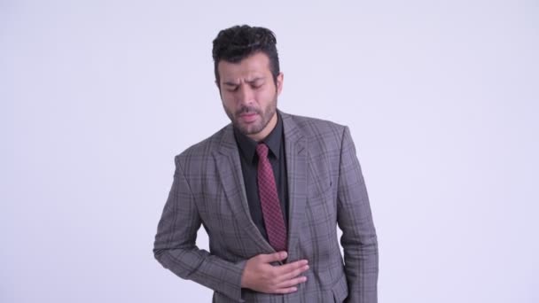 Barbuto stressato uomo d'affari persiano con mal di stomaco — Video Stock