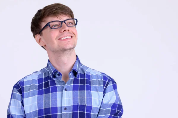 Rosto de jovem hipster feliz homem com óculos pensando — Fotografia de Stock