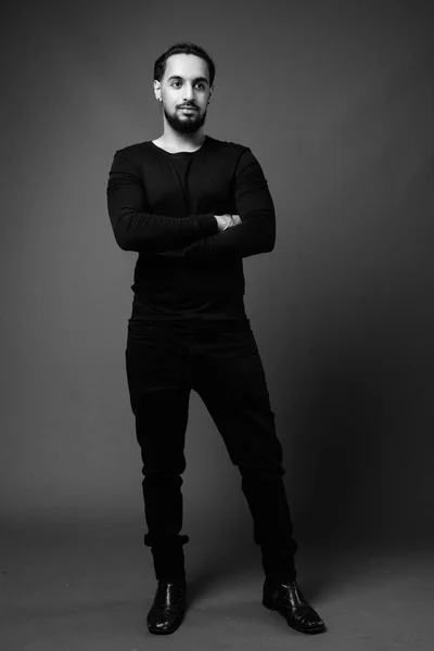 Young bearded Indian man in black and white — Stok fotoğraf