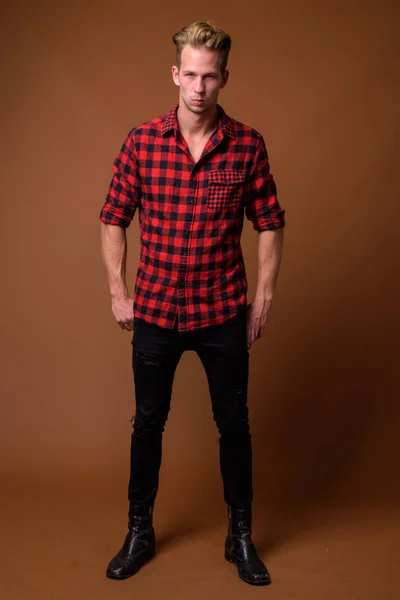 Studio Shot Young Handsome Man Wearing Red Checkered Shirt Brown — Zdjęcie stockowe
