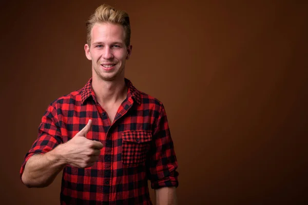 Studio Shot Young Handsome Man Wearing Red Checkered Shirt Brown — стоковое фото