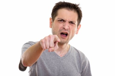 Studio portrait of man isolated against white background