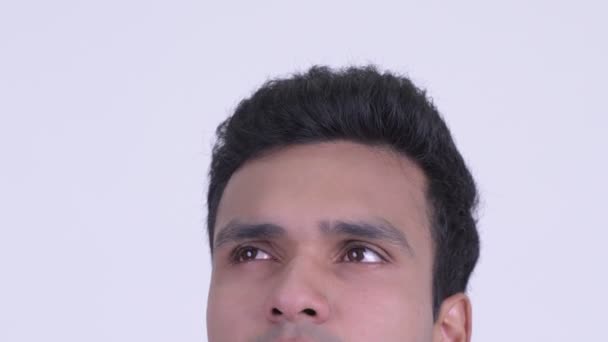 Eyes of young Indian man thinking — Stock Video