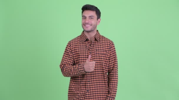 Happy young Hispanic hipster man giving thumbs up — Stock Video