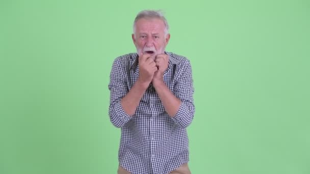 Stressed senior bearded man getting bad news — Stock Video