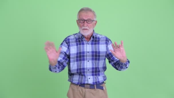 Benadrukt Senior bebaarde hipster man zwaaiende hand Nee — Stockvideo