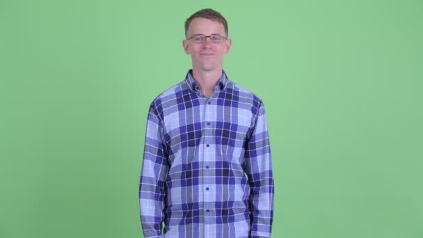 Portrait of happy hipster man with eyeglasses smiling — Stock Video