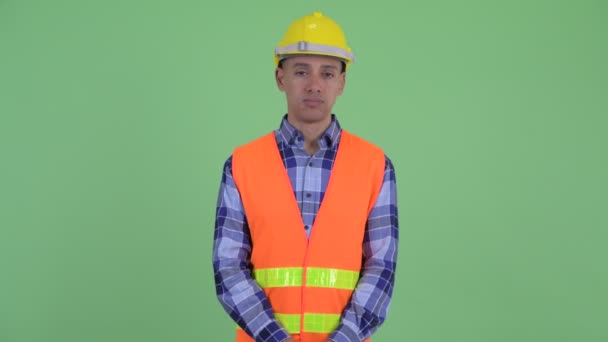 Stressé multi ethnique homme travailleur de la construction donnant pouces vers le bas — Video