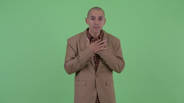 Stressed bald multi ethnic businessman shrugging shoulders and looking guilty — Stock Video