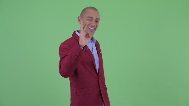 Happy bald multi ethnic businessman with ok sign — Stock Video