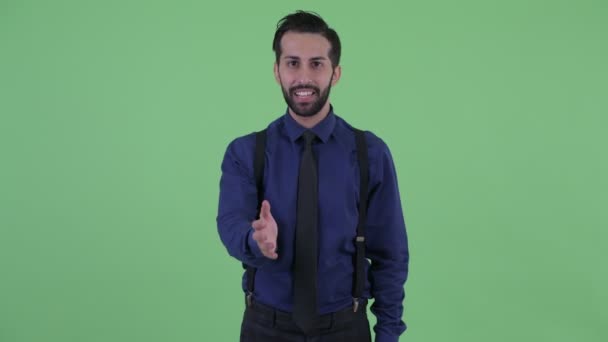 Ευτυχισμένος νέος μουσάτος περσικός επιχειρηματίας δίνοντας χειραψία — Αρχείο Βίντεο