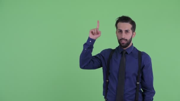 Zdůraznil mladý vousatý perský obchodník směřující nahoru — Stock video