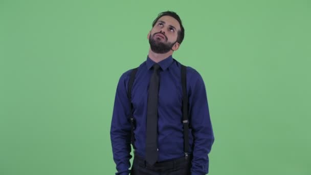 Betonade unga skäggiga Persiska affärsman ser uttråkad och trött — Stockvideo