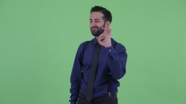 Ok jest ile Mutlu genç sakallı İranlı işadamı