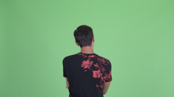 A fiatalember mutatóujjának hátulnézete — Stock videók