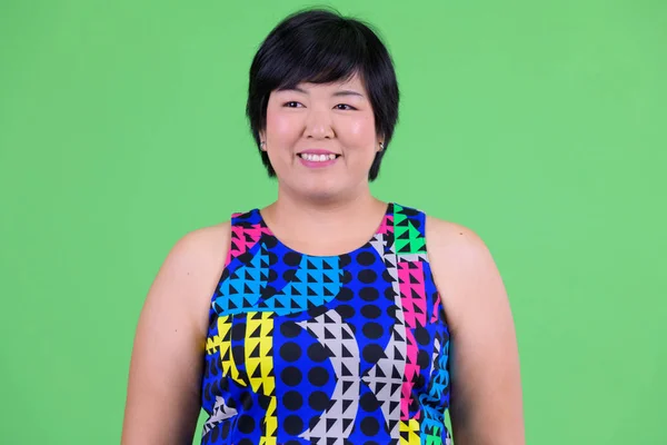Volto di giovani felice sovrappeso asiatico donna pensare pronto per partito — Foto Stock