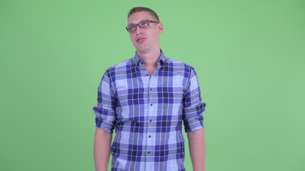 Stressed young hipster man looking bored and tired — Stock Video