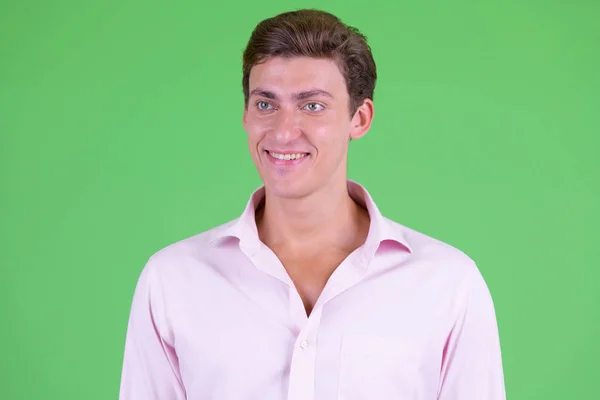 Cara de joven feliz hombre de negocios guapo pensando — Foto de Stock