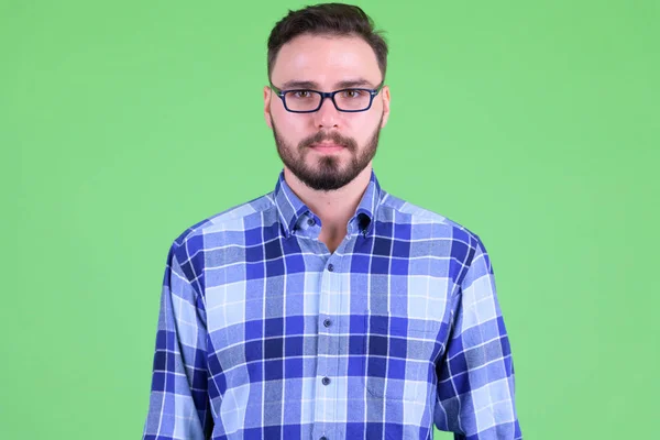 Gesicht eines jungen gutaussehenden bärtigen Hipster-Mannes — Stockfoto