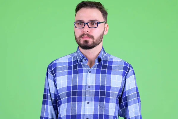 Rosto de jovem bonito barbudo hipster homem pensando — Fotografia de Stock