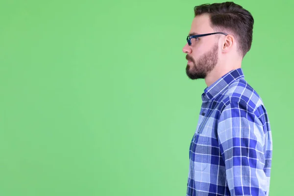 Profiel weergave van jonge knappe bebaarde hipster man — Stockfoto