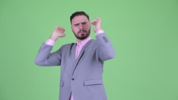 Gelukkig jonge bebaarde zakenman dansen — Stockvideo