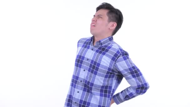 Підкреслив молодий азіатських хіпстера чоловік, що мають болі в спині — стокове відео