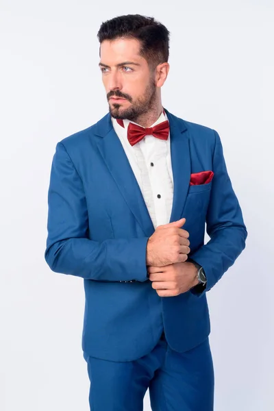 Πορτρέτο του νεαρού όμορφος μουσάτος επιχειρηματίας με μπλε κοστούμι — Φωτογραφία Αρχείου