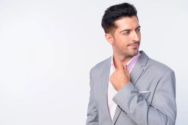 Porträt eines jungen gutaussehenden Geschäftsmannes im grauen Anzug — Stockfoto