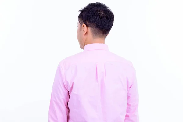 Vista trasera del empresario japonés mirando por encima del hombro —  Fotos de Stock