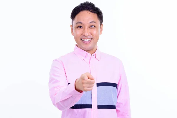 Portrait of happy Japanese businessman pointing at camera — Stock Photo, Image