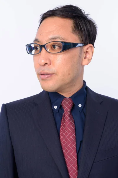 Takım elbiseli Japon iş adamının yüzü — Stok fotoğraf