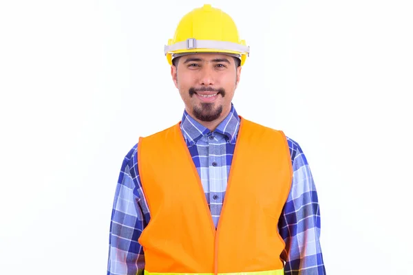 Feliz homem barbudo persa trabalhador da construção sorrindo — Fotografia de Stock