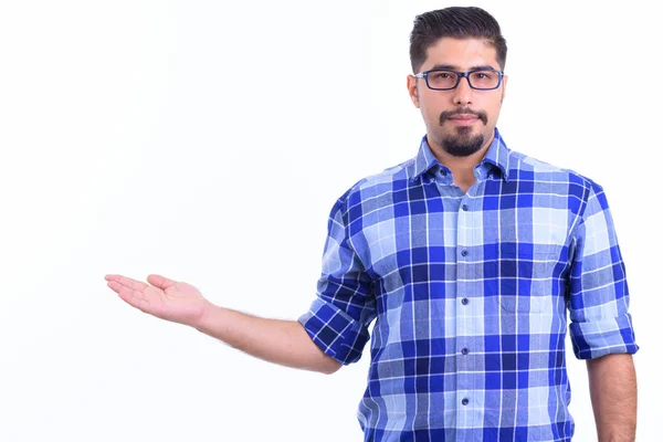 Handsome bearded Persian hipster man showing something — Stock Photo, Image