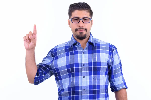 Handsome skäggiga Persiska hipster man pekar uppåt — Stockfoto