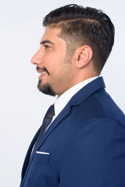 Closeup profil megtekintéséhez boldog szakállas perzsa üzletember mosolygott — Stock Fotó