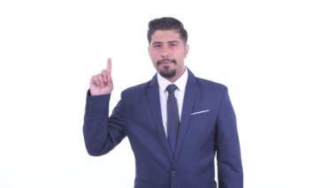 Mutlu sakallı İranlı işadamı işaret
