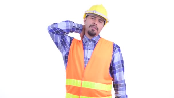 Estressado barbudo persa homem trabalhador de construção com dor no pescoço — Vídeo de Stock