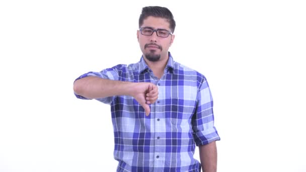 Triste perse hipster homme barbu donnant pouces vers le bas — Video