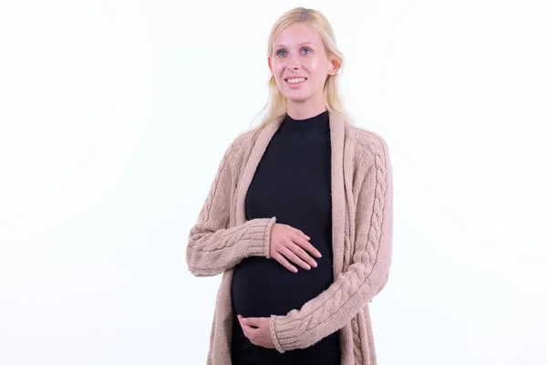 Gelukkig jonge mooie blonde zwangere vrouw denken — Stockfoto