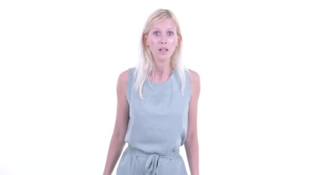 Stressed young blonde woman getting bad news — Stock Video