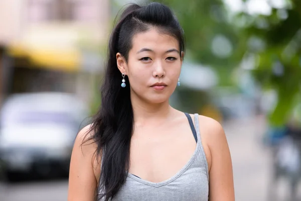 Face of beautiful Asian woman looking at camera — Stock Photo, Image