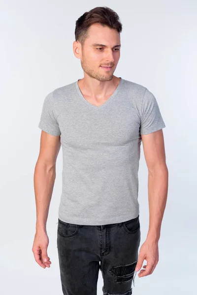 Studio shot of happy handsome man with casual clothing smiling — Stock Photo, Image