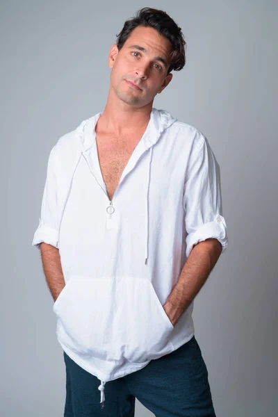 Portrait of handsome Hispanic man wearing hooded shirt — Stock Photo, Image