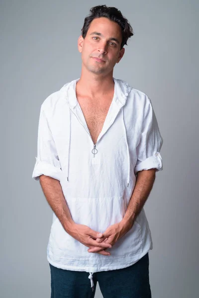 Portrait of handsome Hispanic man wearing hooded shirt — Stock Photo, Image