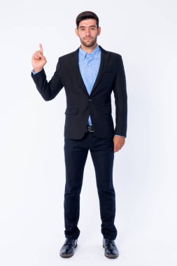 Genç sakallı İranlı işadamının tam vücut fotoğrafı
