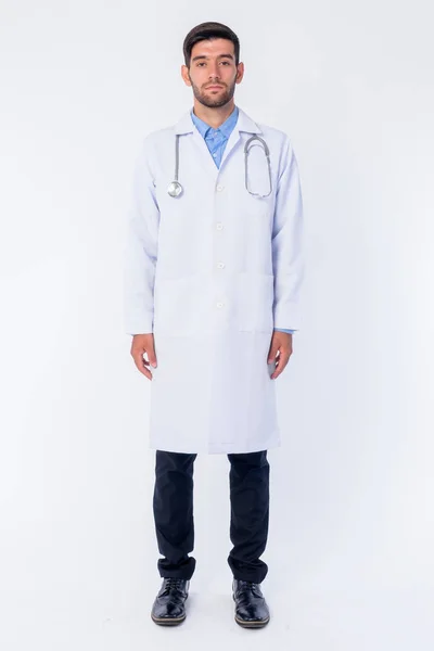 Full body shot of young bearded Persian man doctor — Stock Photo, Image