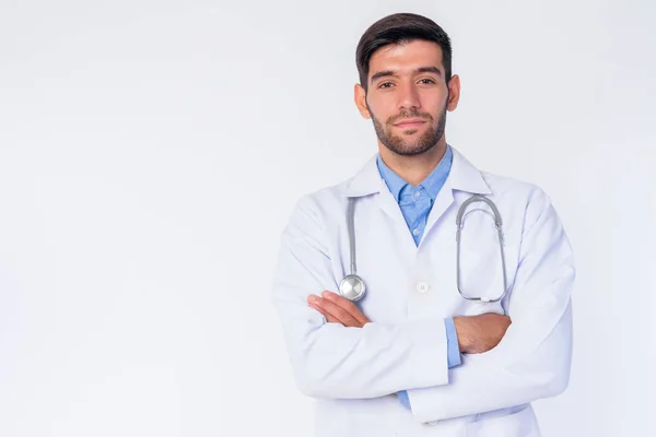 Portrait de jeune homme barbu perse médecin avec les bras croisés — Photo