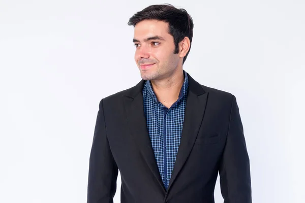 Rostro de joven feliz guapo empresario persa en traje pensando — Foto de Stock